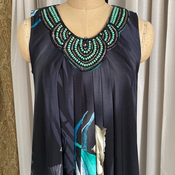 Beautiful dress, tunic even good for pregnancy a polyester and spandex. - Picture 2 of 9